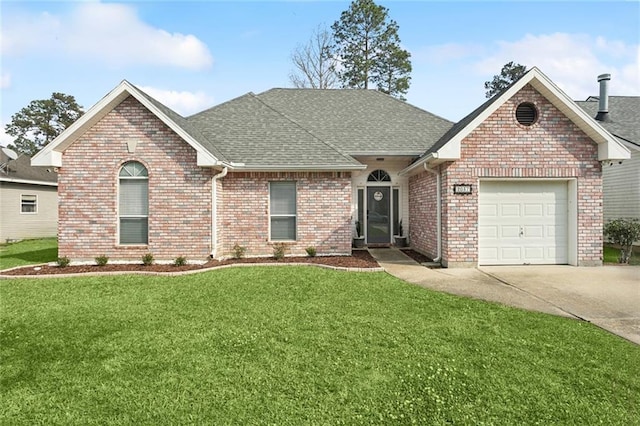 view of front facade with driveway, brick siding, an attached garage, and a front lawn