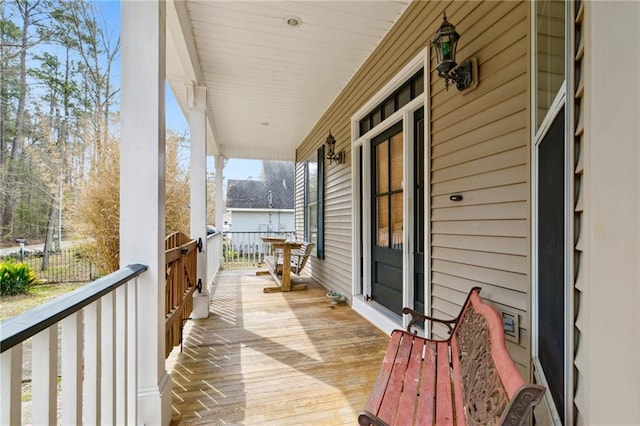 balcony featuring covered porch