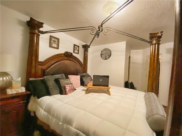 bedroom featuring a textured ceiling