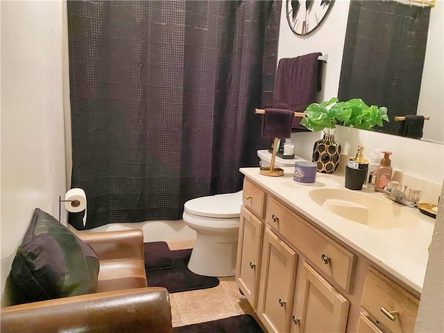 full bathroom with a shower with shower curtain, toilet, vanity, and tile patterned flooring