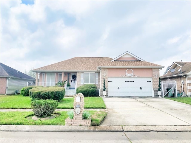 ranch-style house featuring a front yard, brick siding, concrete driveway, and an attached garage