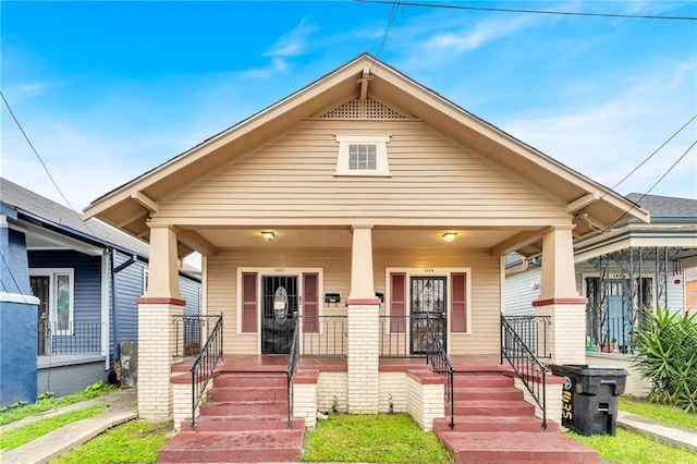 143537 France St, New Orleans, LA 70117 - view of front facade featuring covered porch