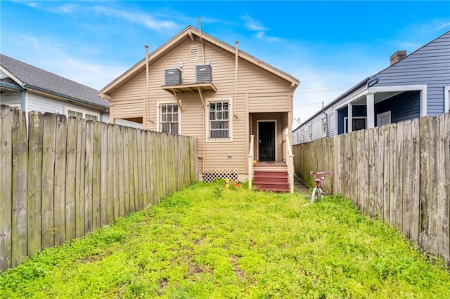 143537 France St, New Orleans, LA 70117 - back of house with a yard and fence