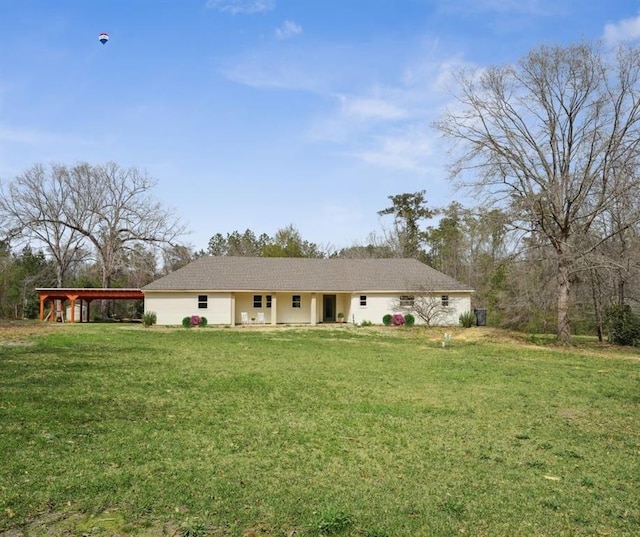 ranch-style house with a front lawn