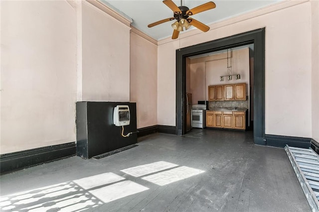 interior space featuring heating unit and a ceiling fan