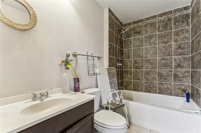 bathroom with shower / bath combination, tile patterned flooring, toilet, and vanity