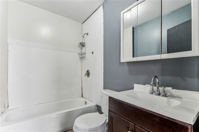 bathroom with vanity, toilet, and shower / bathtub combination