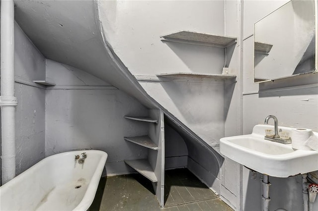 bathroom featuring a freestanding tub