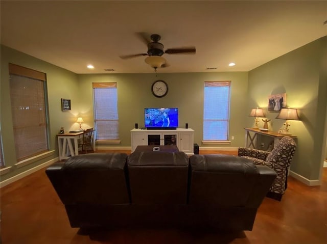 living room with recessed lighting, visible vents, baseboards, and a ceiling fan