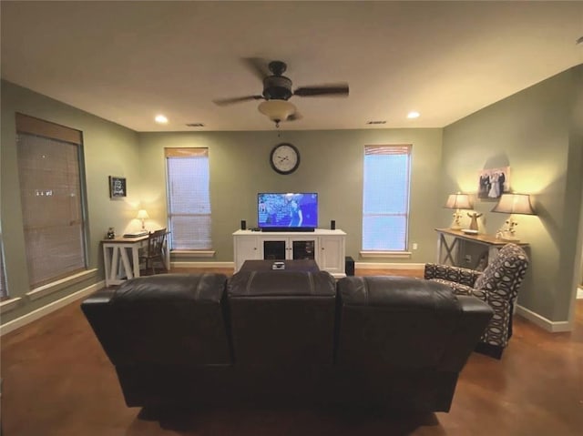 living area featuring recessed lighting, visible vents, baseboards, and ceiling fan