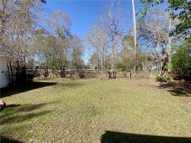 view of yard with fence