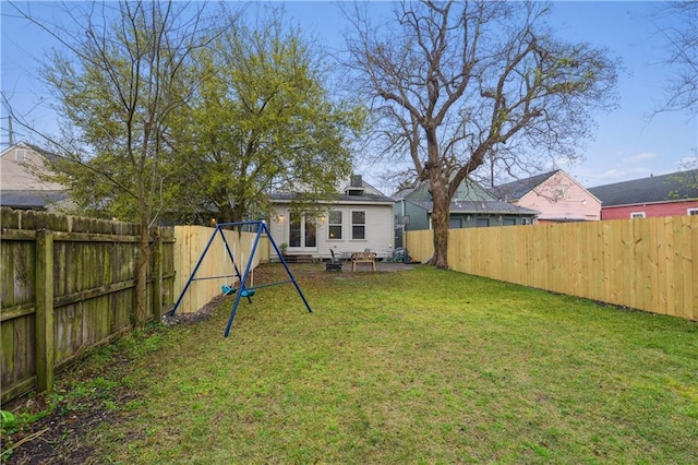 view of yard featuring a fenced backyard