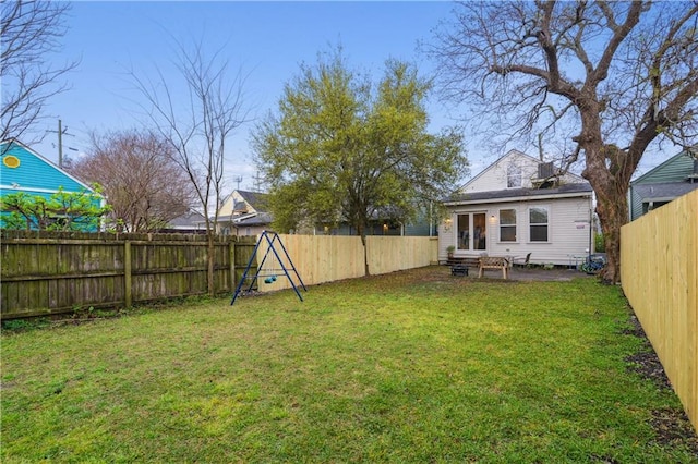 view of yard featuring a fenced backyard