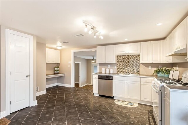 20087 Quincy Ave, Covington, LA 70433 - kitchen with white gas range, dishwasher, white cabinetry, and under cabinet range hood