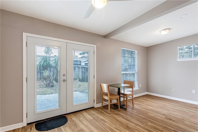 20087 Quincy Ave, Covington, LA 70433 - entryway featuring beamed ceiling, light wood-style flooring, french doors, and baseboards