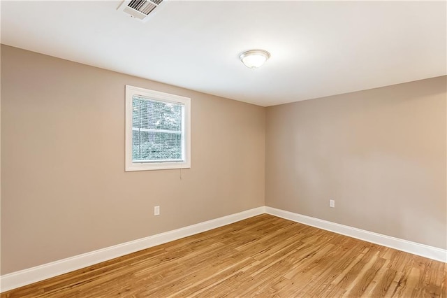 20087 Quincy Ave, Covington, LA 70433 - spare room featuring visible vents, baseboards, and light wood-style floors