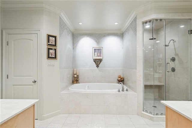 bathroom featuring a stall shower, a garden tub, ornamental molding, and vanity