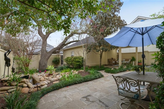 view of patio featuring fence private yard