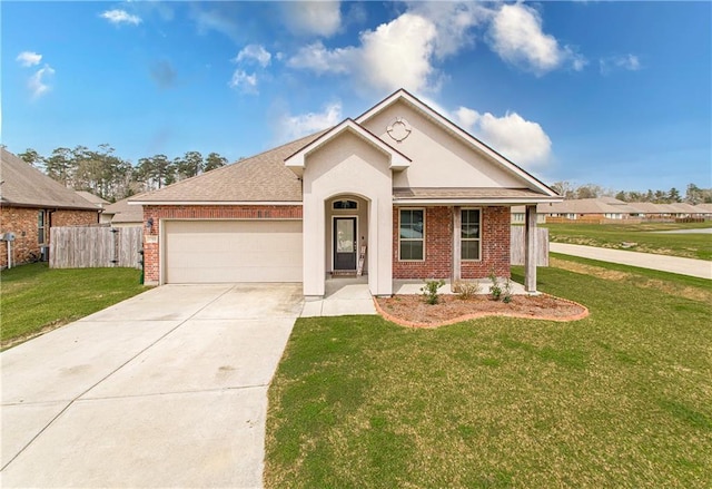 ranch-style home featuring a front yard, brick siding, an attached garage, and driveway