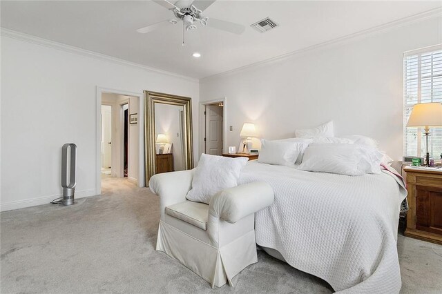 115 Cambridge Dr, Belle Chasse, LA 70037 - bedroom with ceiling fan, visible vents, light carpet, baseboards, and ornamental molding