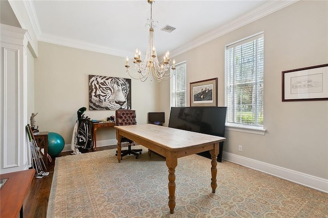 115 Cambridge Dr, Belle Chasse, LA 70037 - home office with wood finished floors, an inviting chandelier, baseboards, visible vents, and crown molding