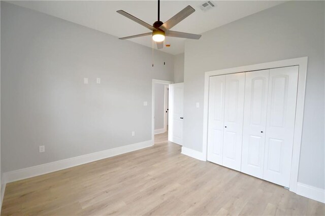 134 Gourgues St, Hahnville, LA 70057 - unfurnished bedroom featuring baseboards, visible vents, light wood-style floors, and a closet