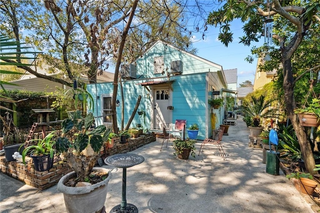 723 Port St, New Orleans, LA 70117 - back of property featuring a patio