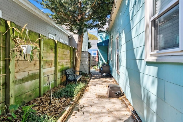 723 Port St, New Orleans, LA 70117 - view of side of property with fence and a patio