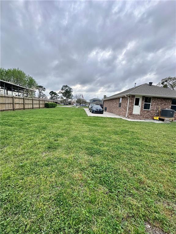 view of yard featuring fence
