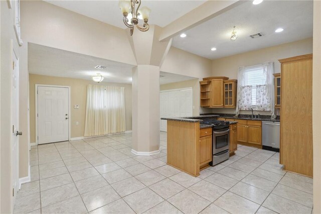 kitchen featuring visible vents, open shelves, appliances with stainless steel finishes, and plenty of natural light