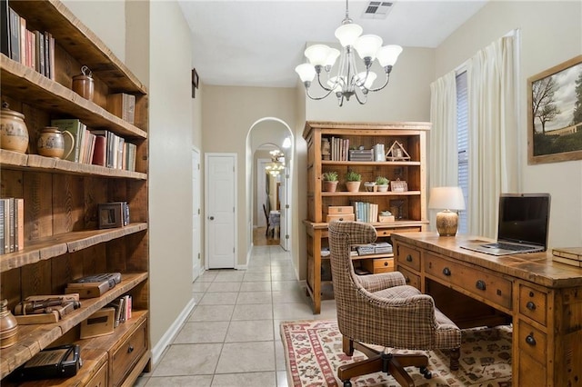 office space with visible vents, baseboards, arched walkways, light tile patterned flooring, and a notable chandelier