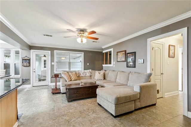 448 Lynnmeade Rd, Gretna, LA 70056 - living area with crown molding and ceiling fan