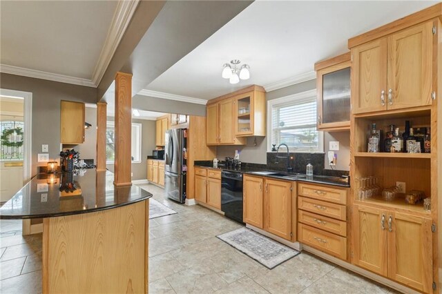 448 Lynnmeade Rd, Gretna, LA 70056 - kitchen with stainless steel fridge, black dishwasher, ornamental molding, glass insert cabinets, and ornate columns