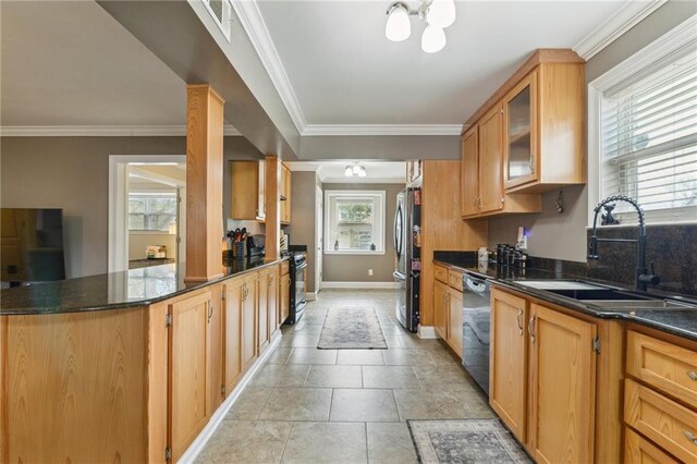 448 Lynnmeade Rd, Gretna, LA 70056 - kitchen with stainless steel appliances, glass insert cabinets, dark stone countertops, crown molding, and a peninsula