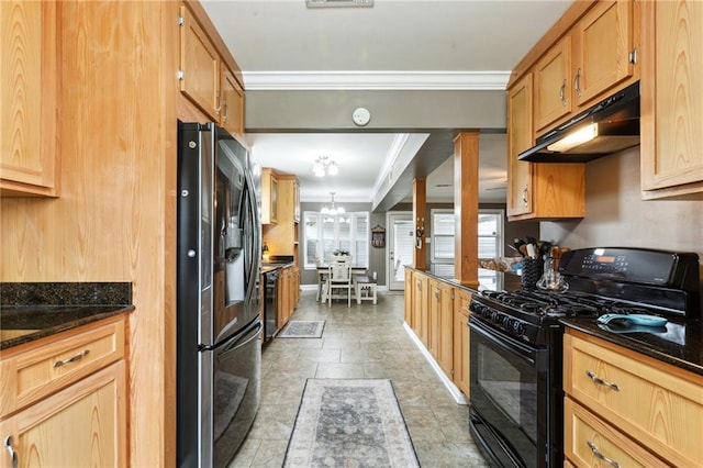 448 Lynnmeade Rd, Gretna, LA 70056 - kitchen with black gas range, stainless steel fridge, crown molding, under cabinet range hood, and light stone finish flooring