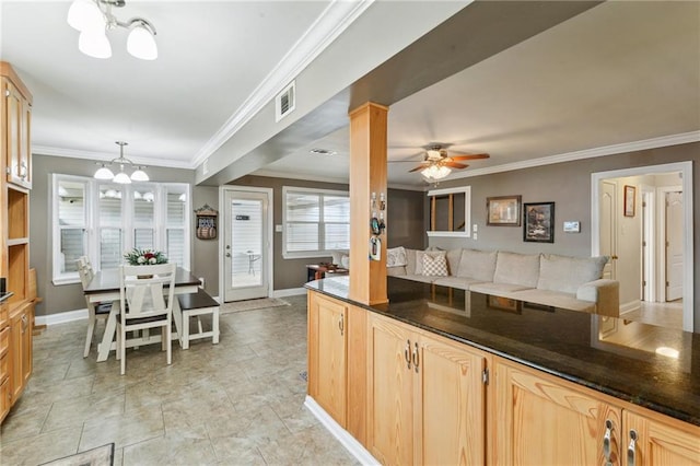 448 Lynnmeade Rd, Gretna, LA 70056 - kitchen featuring a chandelier, ornamental molding, light brown cabinets, ceiling fan, and open floor plan