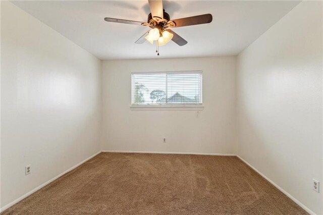 448 Lynnmeade Rd, Gretna, LA 70056 - carpeted spare room featuring a ceiling fan and baseboards