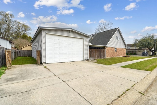 448 Lynnmeade Rd, Gretna, LA 70056 - view of property exterior featuring an outbuilding and a detached garage