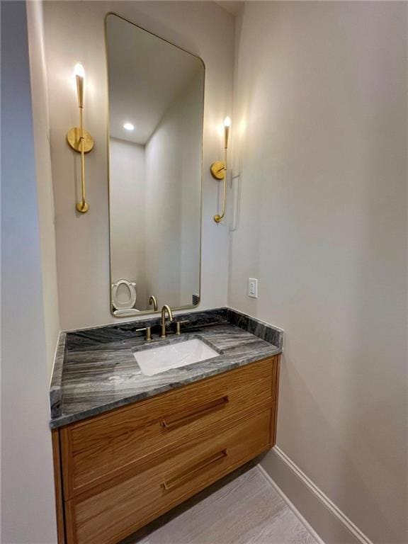 138 Wood Duck Dr, Belle Chasse, LA 70037 - bathroom featuring vanity and baseboards