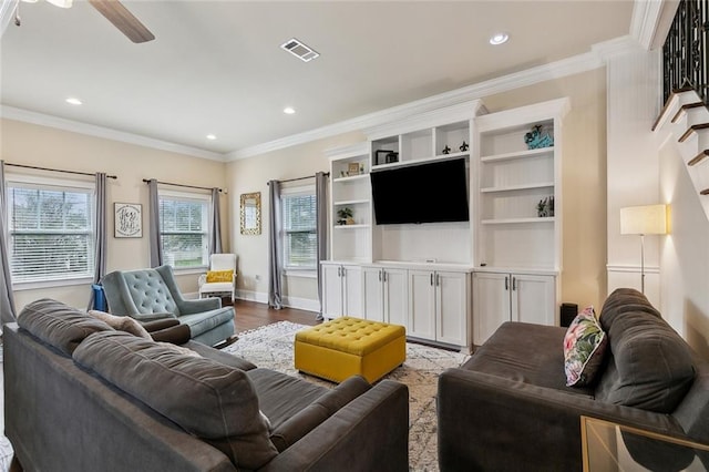 living room with recessed lighting, baseboards, wood finished floors, and crown molding