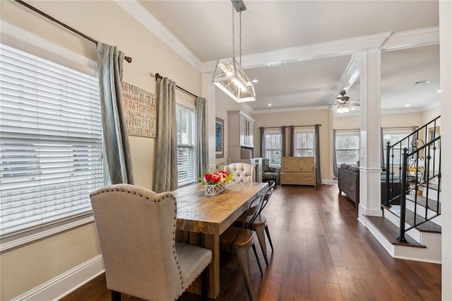 dining room featuring dark wood-style floors, stairway, crown molding, and baseboards