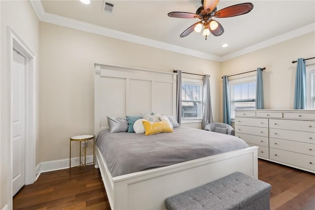 bedroom featuring visible vents, dark wood-style flooring, and crown molding