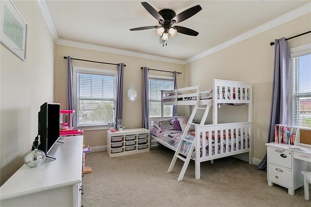 bedroom featuring ceiling fan, light carpet, baseboards, and ornamental molding