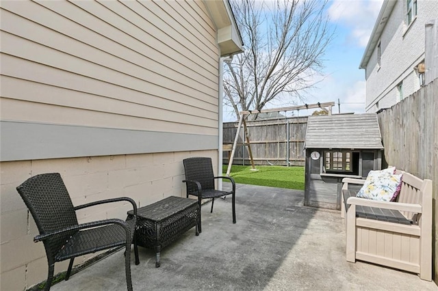 view of patio featuring a fenced backyard