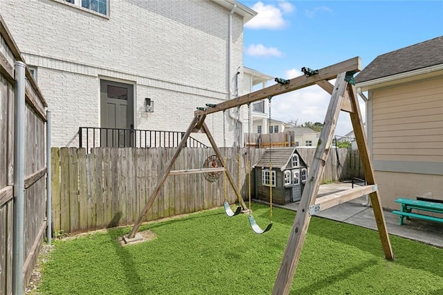 view of yard featuring a patio area and a fenced backyard