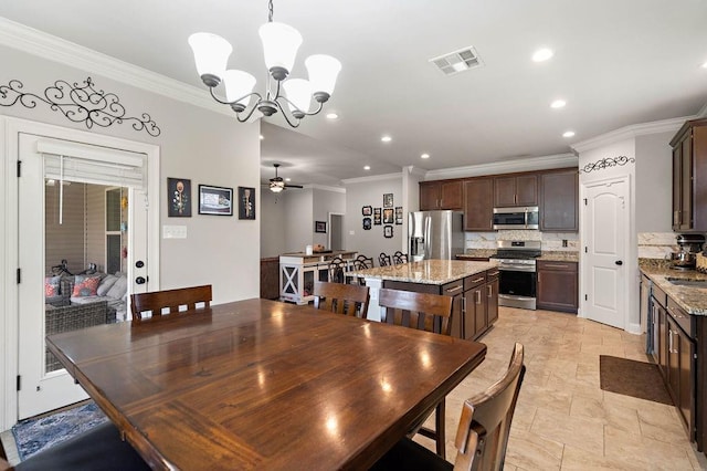 dining space with recessed lighting, visible vents, ornamental molding, and ceiling fan with notable chandelier