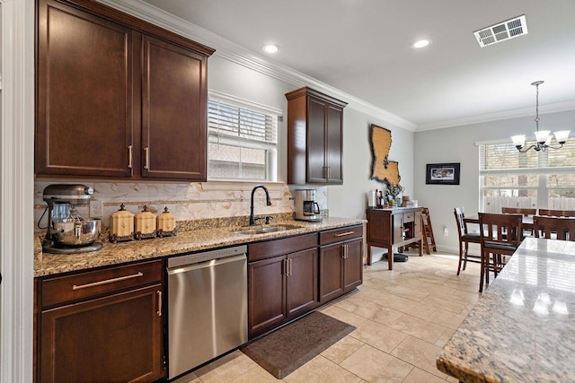 kitchen featuring visible vents, a sink, dishwasher, a notable chandelier, and backsplash