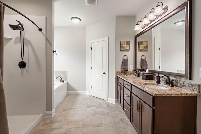 bathroom with double vanity, a bath, a shower, and a sink