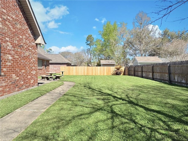 view of yard featuring a fenced backyard