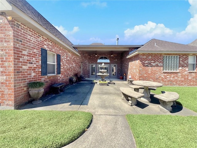 view of patio / terrace featuring french doors